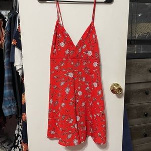 Red cotton on floral romper (never worn)